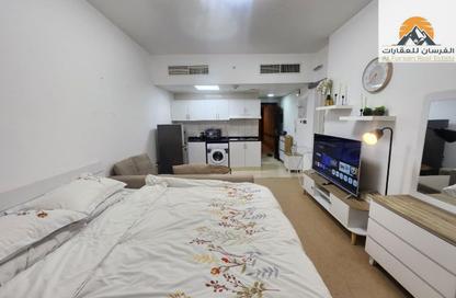 Apartment - Studio - 1 for rent in Orient Tower 1 - Orient Towers - Al Bustan - Ajman