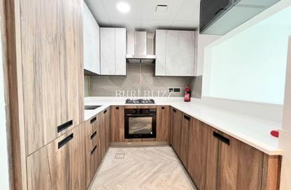 Apartment - 2 - 4 for rent in Alef Noon Residence - District 16 - Jumeirah Village Circle - Dubai