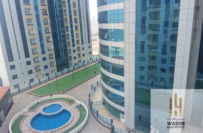 Apartment - 1 Bedroom - 2 Bathrooms for sale in Orient Tower 1 - Orient Towers - Al Bustan - Ajman