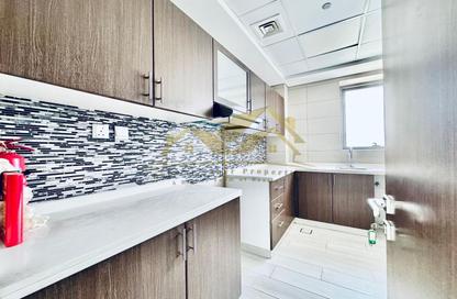 Apartment - 1 Bedroom - 2 Bathrooms for rent in Jumeirah Garden City - Al Satwa - Dubai