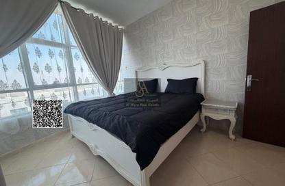 Apartment - 2 Bedrooms - 2 Bathrooms for sale in Orient Tower 1 - Orient Towers - Al Bustan - Ajman