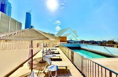 Apartment - 1 Bedroom - 2 Bathrooms for rent in Jumeirah Garden City - Al Satwa - Dubai