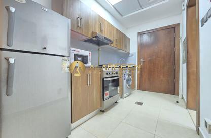 Apartment - Studio - 1 for rent in National Bonds Residence - District 15 - Jumeirah Village Circle - Dubai