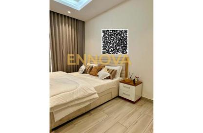 Apartment - 1 Bedroom - 2 Bathrooms for sale in Al Aamra Tower - Al Amerah - Ajman