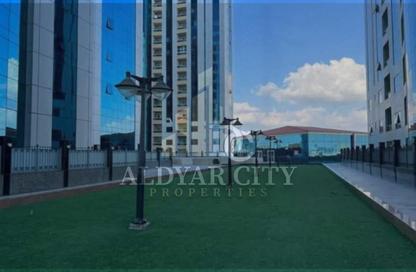 Apartment - 2 Bedrooms - 2 Bathrooms for sale in Orient Tower 2 - Orient Towers - Al Bustan - Ajman