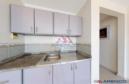 Apartment - Studio - 1 for rent in Arenco Buildings - Al Madar 2 - Al Madar - Umm Al Quwain