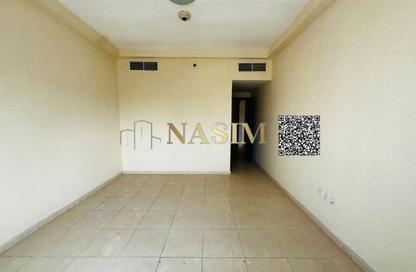 Apartment - 1 Bedroom - 2 Bathrooms for sale in Orient Tower 1 - Orient Towers - Al Bustan - Ajman