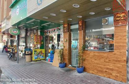 Shop - Studio for rent in Al Karama Sqaure - Al Karama - Dubai