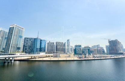 Apartment - 1 - 1 for sale in Mayfair Residency - Business Bay - Dubai