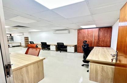 Business Centre - Studio - 2 Bathrooms for rent in Al Kazim Building - Karama Park Area - Al Karama - Dubai