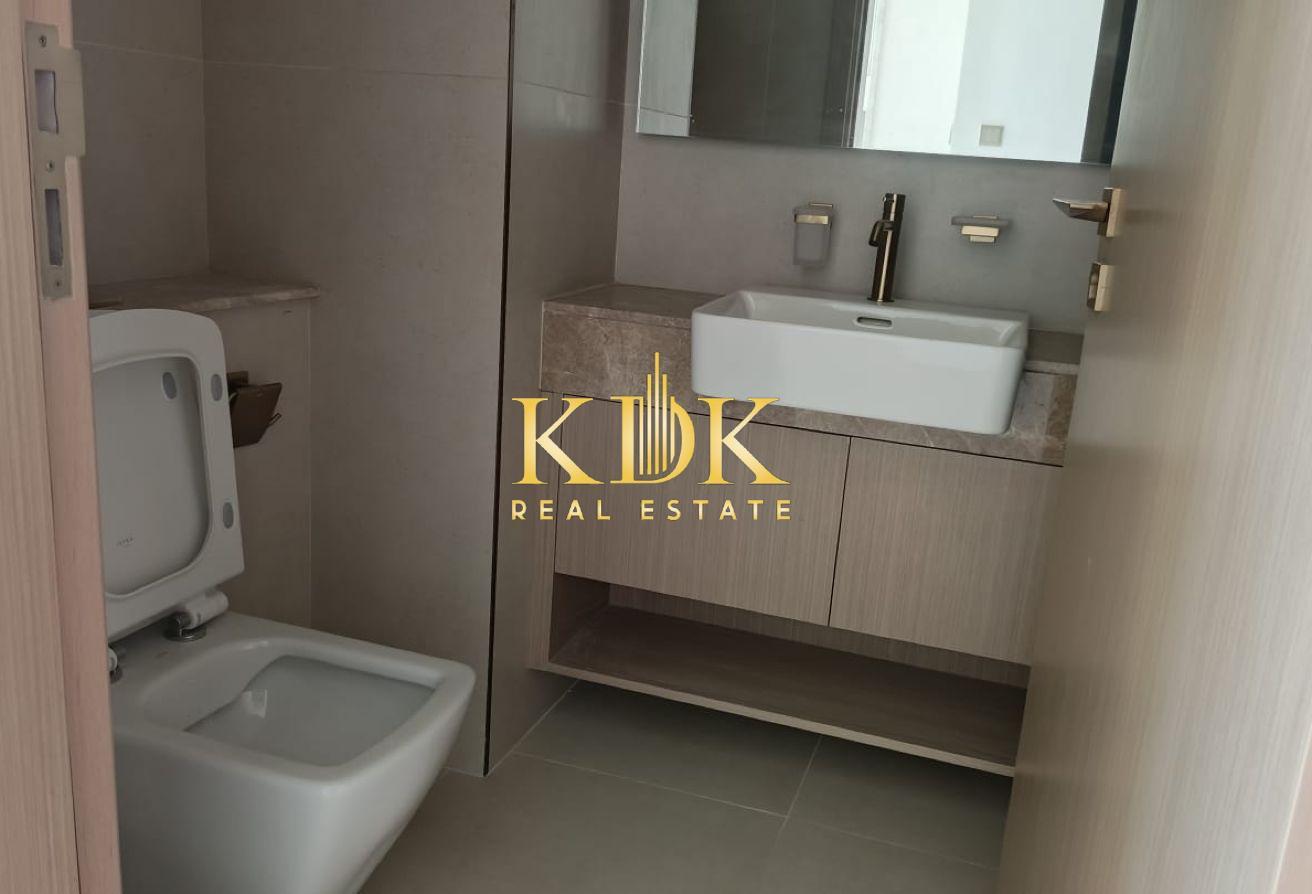 High-Floor 1BR | Laundry Room | Park View photo 19