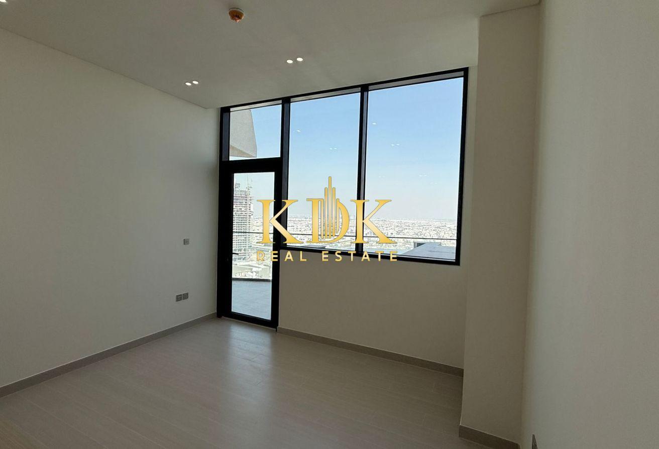 High-Floor 1BR | Laundry Room | Park View photo 5