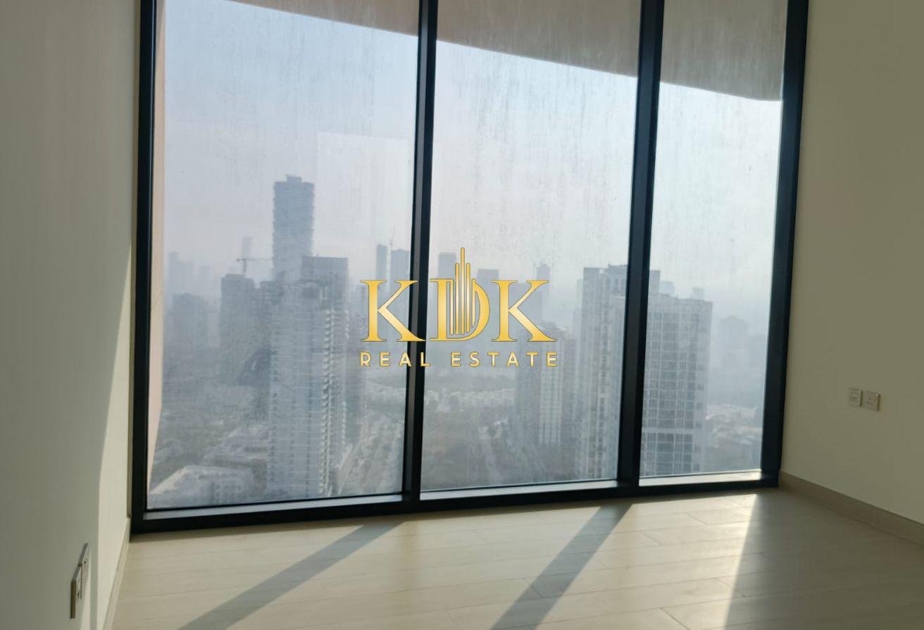 High-Floor 1BR | Laundry Room | Park View photo 8