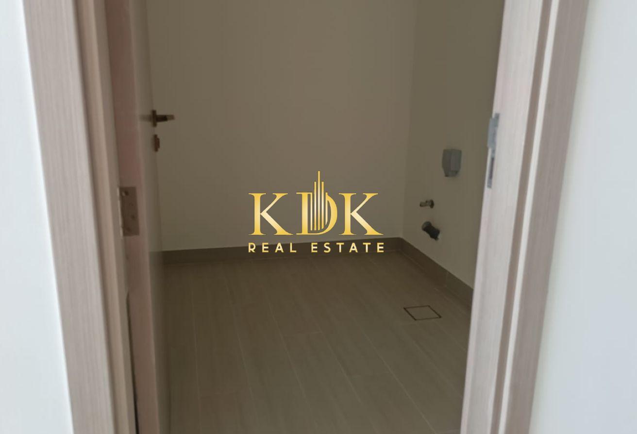 High-Floor 1BR | Laundry Room | Park View photo 12