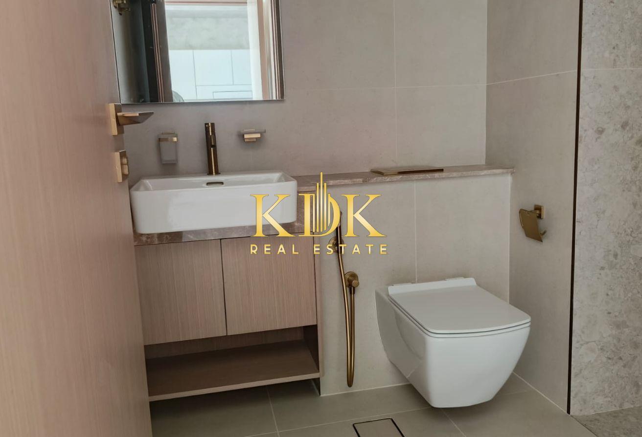 High-Floor 1BR | Laundry Room | Park View photo 16