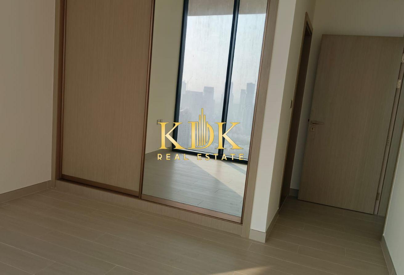 High-Floor 1BR | Laundry Room | Park View photo 7