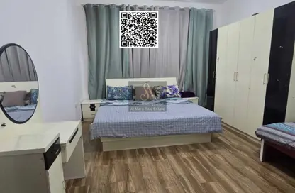 Apartment - 1 Bedroom - 2 Bathrooms for rent in Corniche Tower - Ajman Corniche Road - Ajman