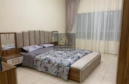 Apartment - 1 Bedroom - 2 Bathrooms for sale in Orient Tower 1 - Orient Towers - Al Bustan - Ajman