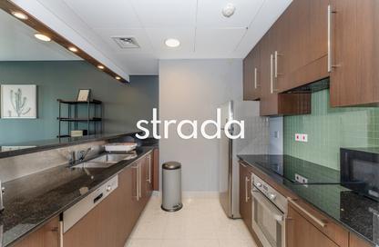 Apartment - 1 - 2 for rent in Burj Daman - DIFC - Dubai