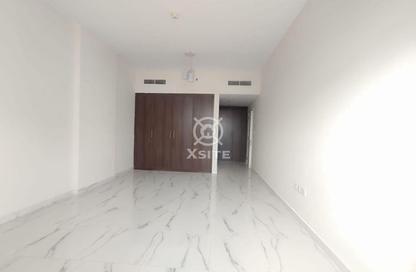 Apartment - 1 Bedroom - 2 Bathrooms for rent in Olimpico Residences - International City Phase 2 - Al Warsan 4 - Al Warsan - Dubai