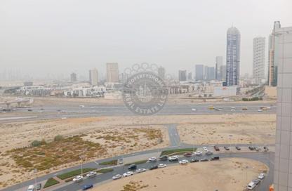 Apartment - 1 Bedroom - 2 Bathrooms for rent in Cricket Tower - Dubai Sports City - Dubai