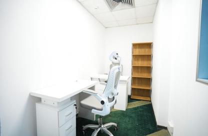 Business Centre - Studio - 2 Bathrooms for rent in Al Kazim Building - Karama Park Area - Al Karama - Dubai