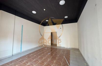 Shop - Studio for rent in Building Z01 - England Cluster - International City - Dubai