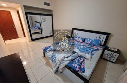 Apartment - 2 Bedrooms - 2 Bathrooms for rent in Orient Tower 1 - Orient Towers - Al Bustan - Ajman