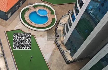 شقة - 2 غرف نوم - 2 حمامات للبيع في أورينت تاور 1 - أورينت تاور - البستان - عجمان