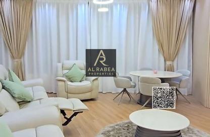 Apartment - 2 Bedrooms - 3 Bathrooms for sale in Orient Tower 1 - Orient Towers - Al Bustan - Ajman