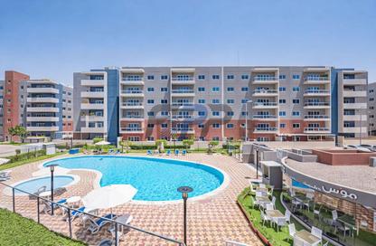 Apartment - 3 - 4 for sale in Tower 1 - Al Reef Downtown - Al Reef - Abu Dhabi