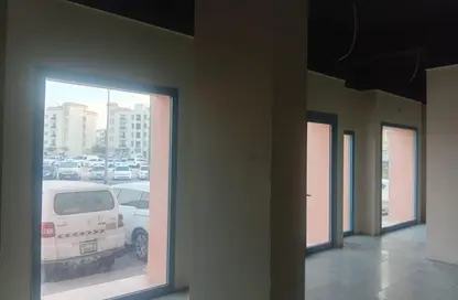 Shop - Studio for rent in Building Y26 - England Cluster - International City - Dubai