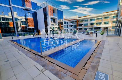 Apartment - Studio - 1 for rent in National Bonds Residence - District 15 - Jumeirah Village Circle - Dubai