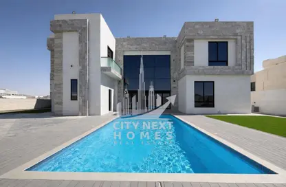 Villa - 5 Bedrooms - 7 Bathrooms for rent in Wadi Alshabak - Dubai