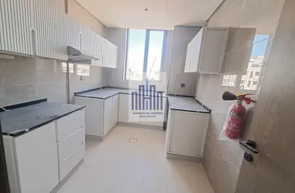 شقة - غرفة نوم - 2 حمامات للايجار في الزاهية 1 - الزاهية - تجارية مويلح - الشارقة