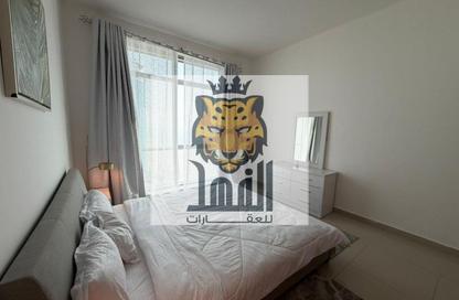 Apartment - 1 - 2 for rent in Corniche Tower - Ajman Corniche Road - Ajman