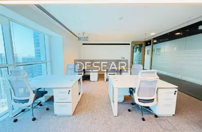 مركز أعمال - استوديو - 2 حمامات للايجار في البرج المفرد - شارع الشيخ زايد - دبي
