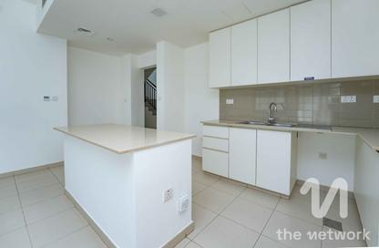 Townhouse - 4 - 4 for sale in Noor Townhouses - Town Square - Dubai