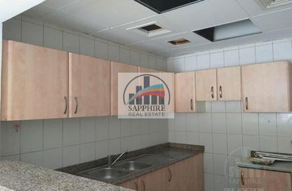 Apartment - 1 Bedroom - 2 Bathrooms for rent in Building P04 - France Cluster - International City - Dubai Apartment - 1 Bedroom - 2 Bathrooms for rent in Building P04 - France Cluster - International City - Dubai