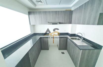 Apartment - 1 - 2 for rent in Orchid Residence - Dubai Science Park - Dubai