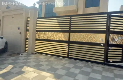 Villa - 4 Bedrooms - 7 Bathrooms for rent in Al Helio 1 - Al Helio - Ajman