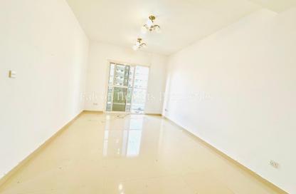 Apartment - 1 Bedroom - 2 Bathrooms for rent in Amna Building - International City Phase 2 - Al Warsan 4 - Al Warsan - Dubai