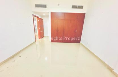 Apartment - 1 Bedroom - 2 Bathrooms for rent in Amna Building - International City Phase 2 - Al Warsan 4 - Al Warsan - Dubai