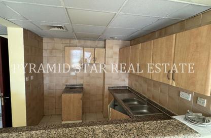 Apartment - 1 - 2 for rent in Building J06 - Morocco Cluster - International City - Dubai