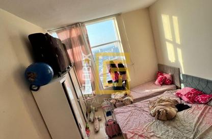Apartment - 2 Bedrooms - 2 Bathrooms for sale in Orient Tower 1 - Orient Towers - Al Bustan - Ajman