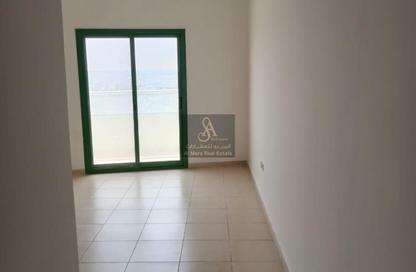 Apartment - 1 Bedroom - 2 Bathrooms for sale in Smart Tower 1 - Al Amerah - Ajman