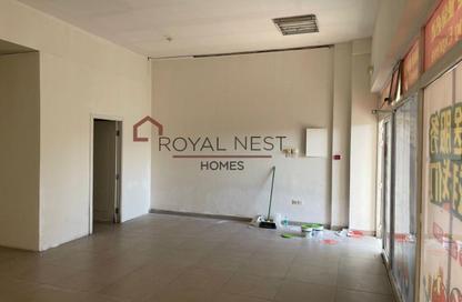 محل - استوديو - 1 حمام للايجار في واي-06 - طراز إنجليزي - المدينة العالمية - دبي