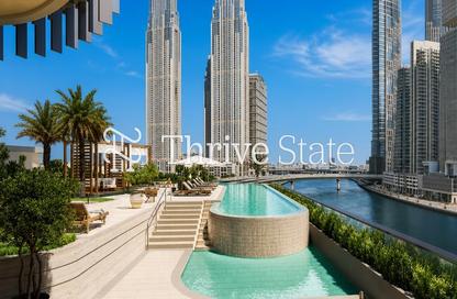 Apartment - 1 - 2 for sale in One River Point - Business Bay - Dubai