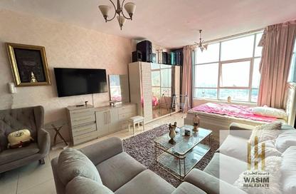 Apartment - Studio - 1 for rent in Orient Tower 1 - Orient Towers - Al Bustan - Ajman