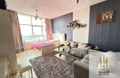 Apartment - Studio - 1 for rent in Orient Tower 1 - Orient Towers - Al Bustan - Ajman